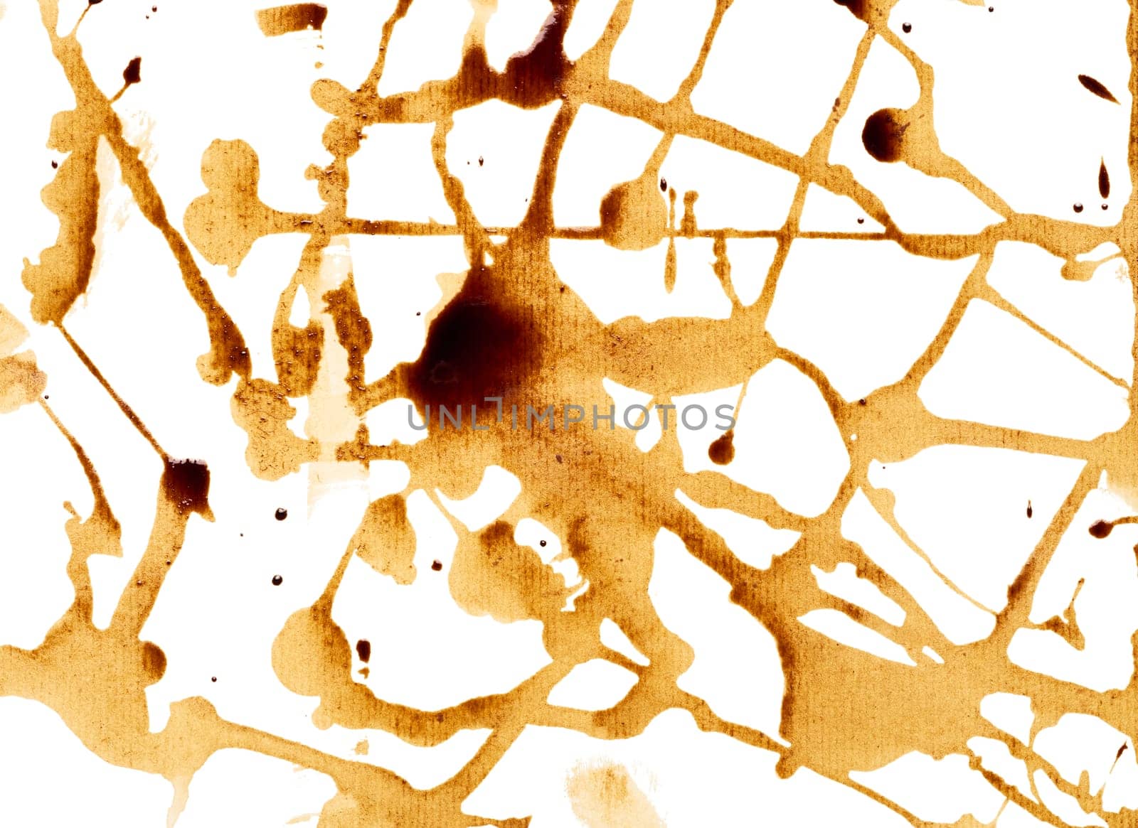 Spilled black coffee, splashes on a white background, close up