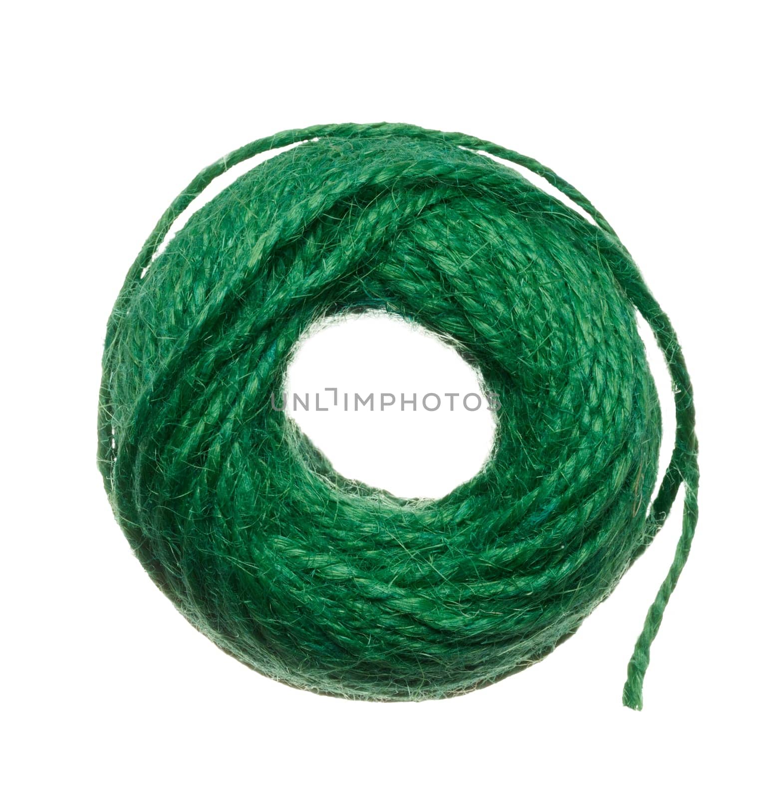 Skein of green thread on a white isolated background, top view