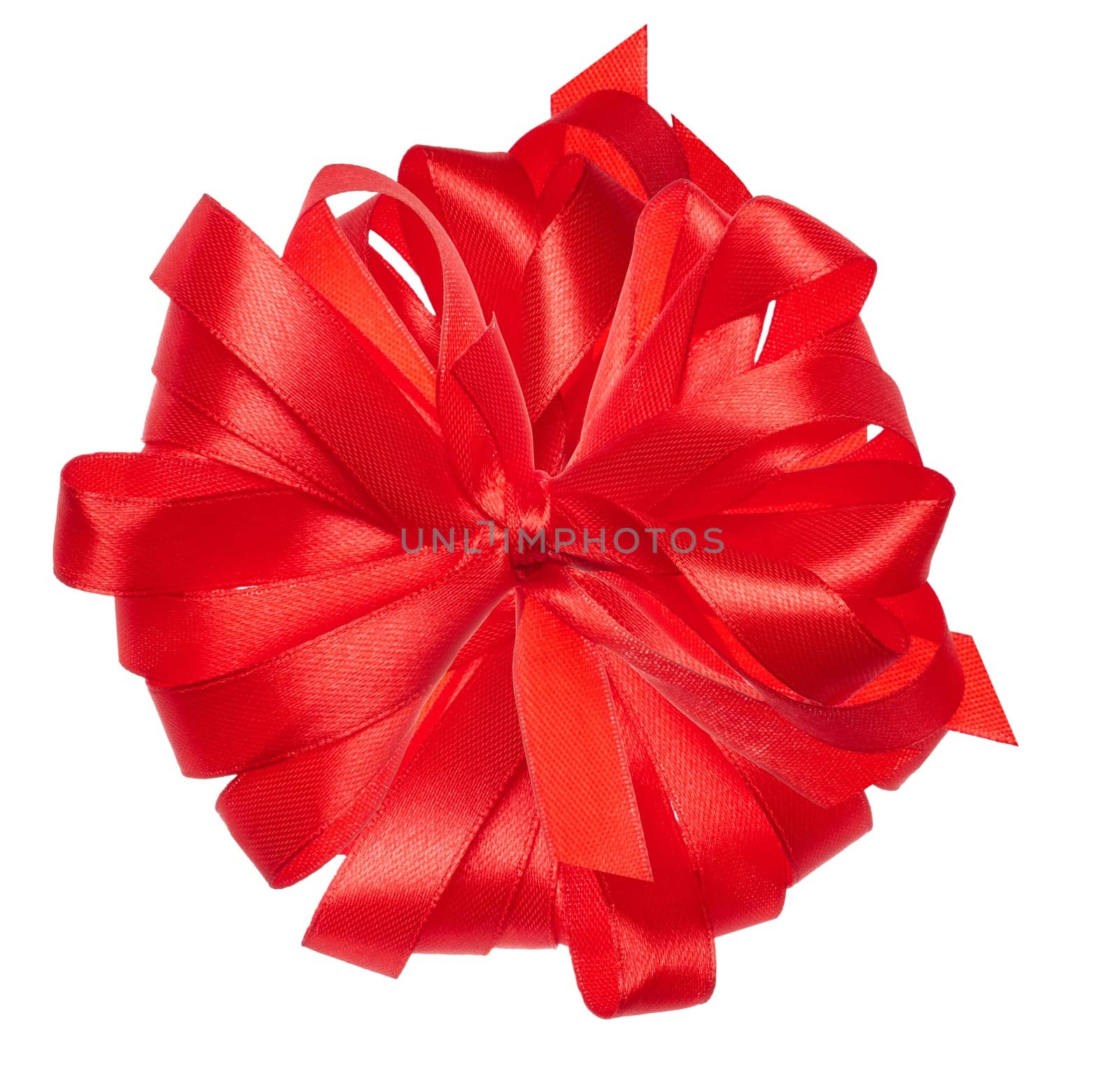 Knotted red satin ribbon bow on isolated background, top view