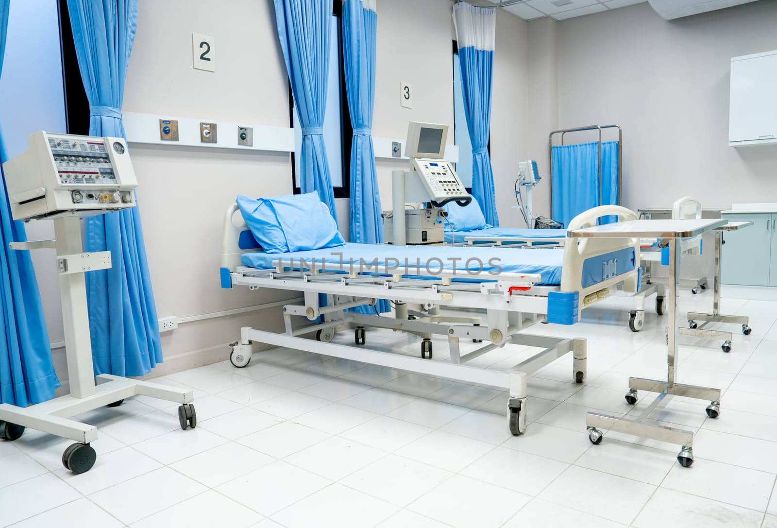 Empty room with patient bed and tools also instruments to support treatment patients in hospital or clinic. by nrradmin