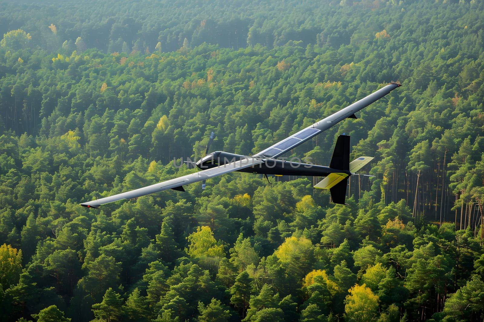 Solar-powered army drone in flight above green forest canopy, showcasing modern surveillance and renewable energy technology in military operations.