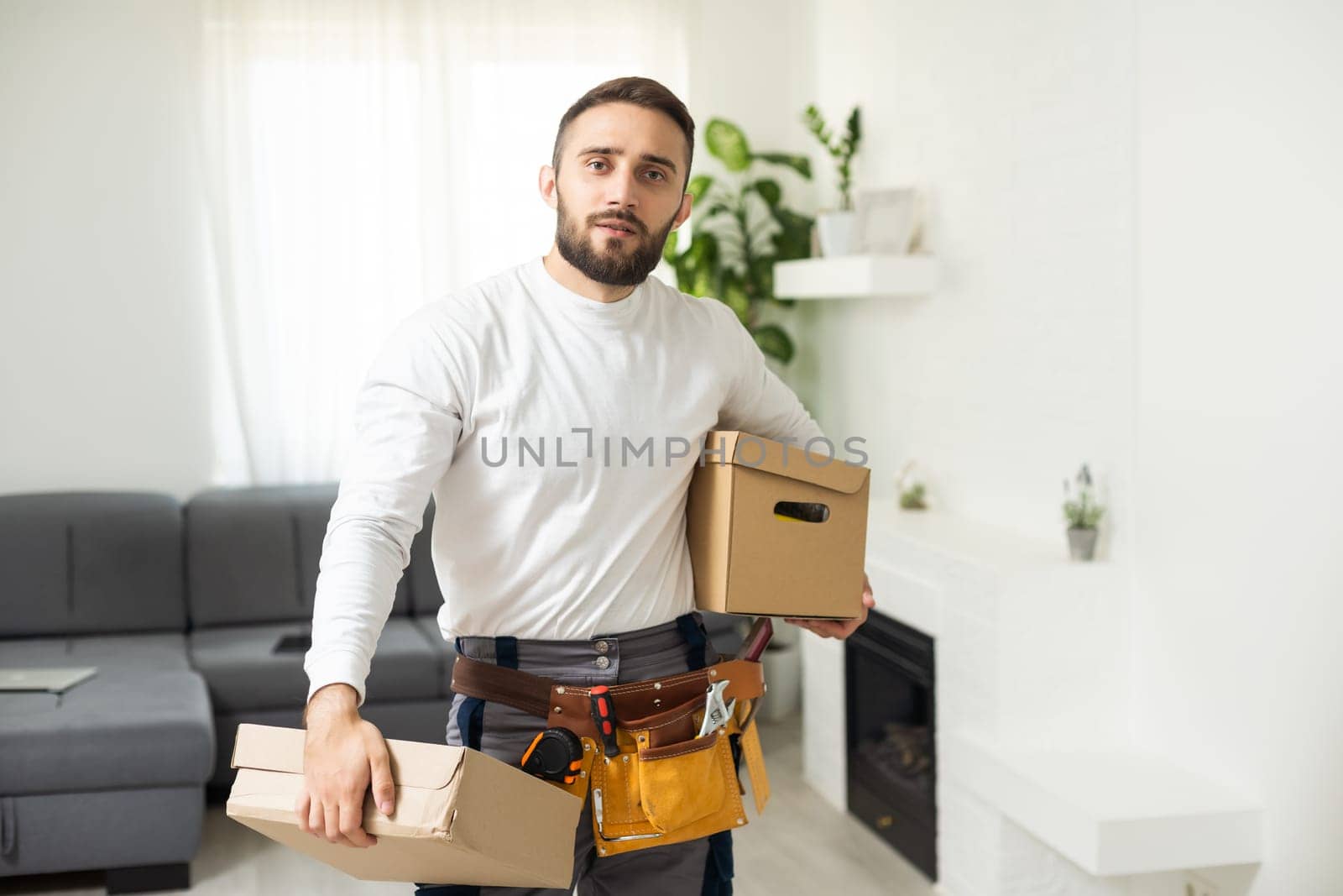 Young hispanic man business worker smiling confident by Andelov13