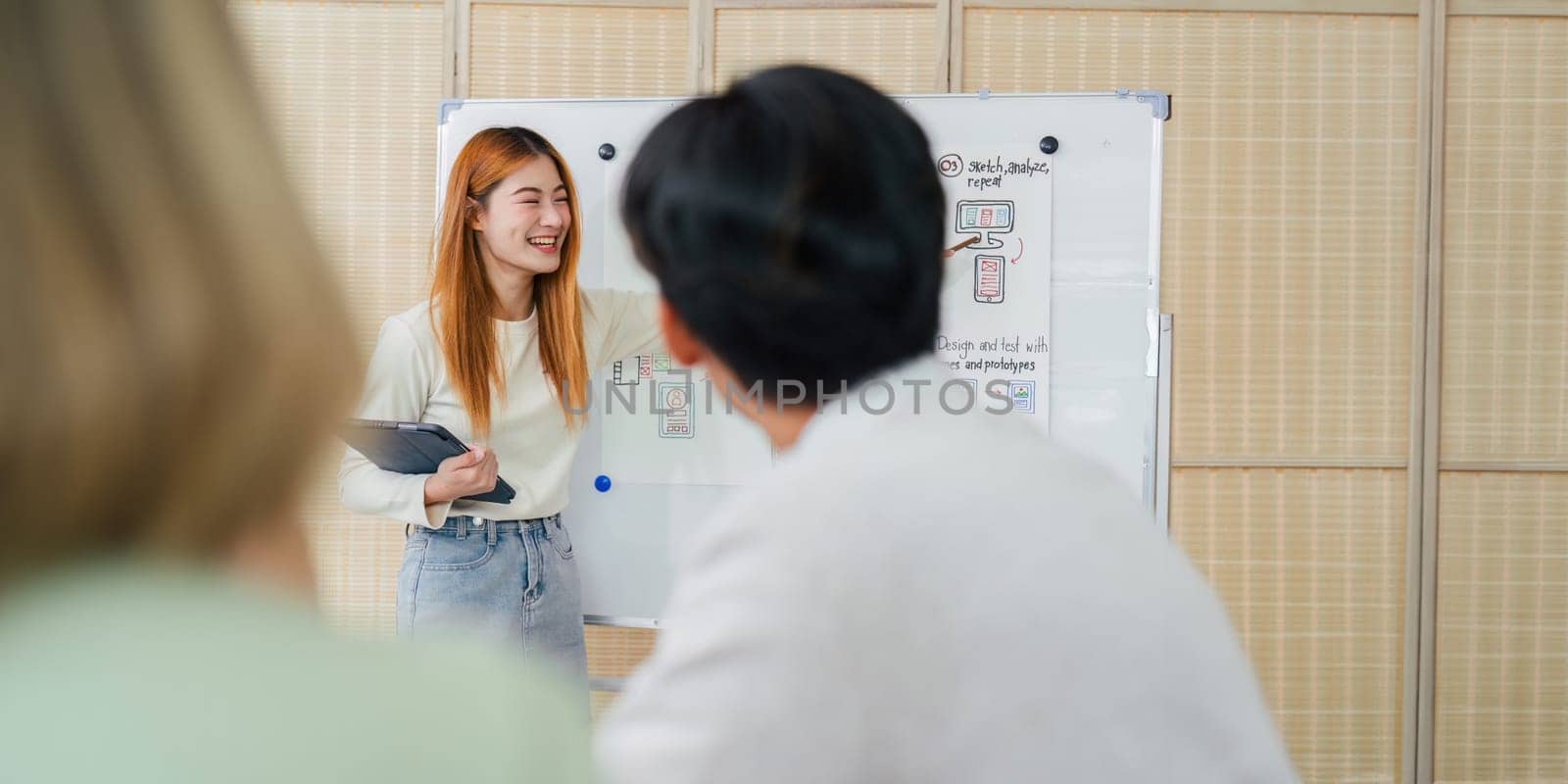 UI designers present to team about color design of logo during application design brainstorming. Creative digital development agency. UX UI concept.