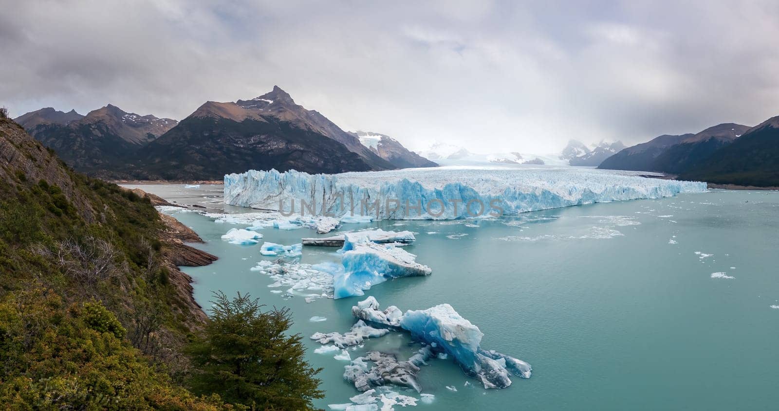 Majestic Glacier View with Floating Icebergs in Lake by FerradalFCG