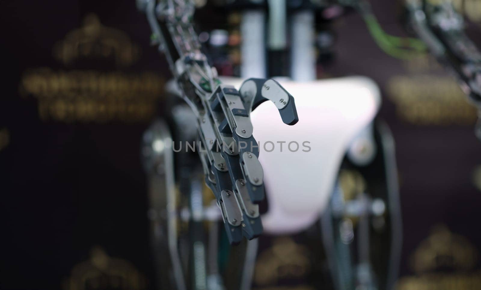 Robot stretching out metal hand for handshake closeup by kuprevich