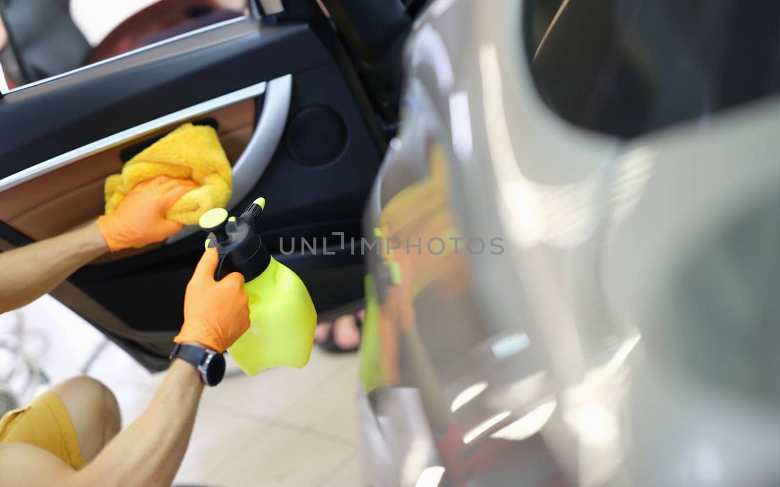 Professional dry cleaning of car interior and doors. Car interior dry cleaning concept
