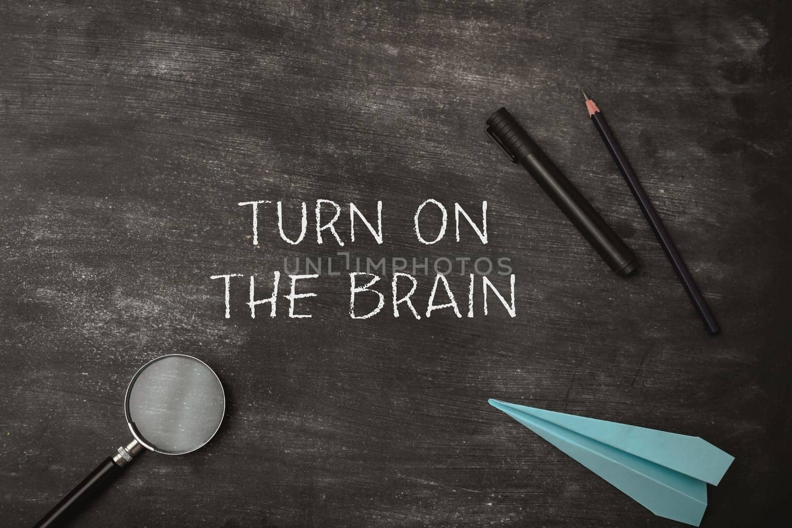 Turn on the brain is written on the chalkboard by Alla_Morozova93
