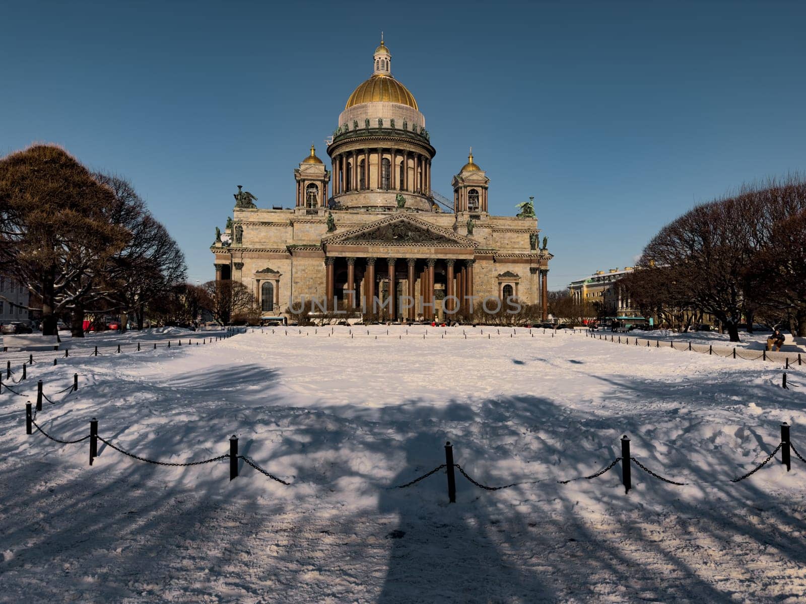 Snow-covered Park in front of St. Isaac's Cathedral in St. Petersburg - Russia in the spring sun. High quality photo