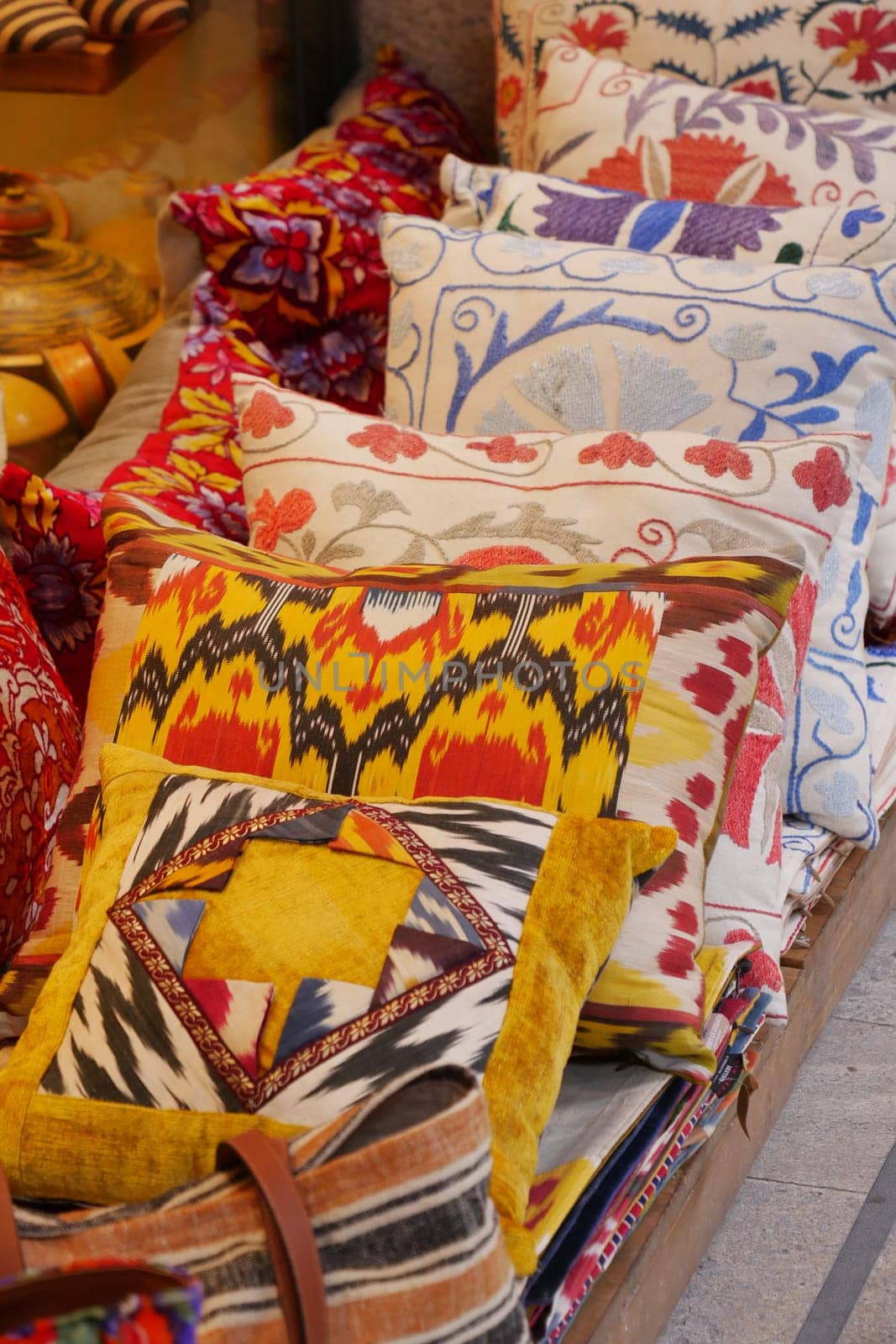 Colourful cushions on display for sale in a traditional Turkish Bazaar. by towfiq007