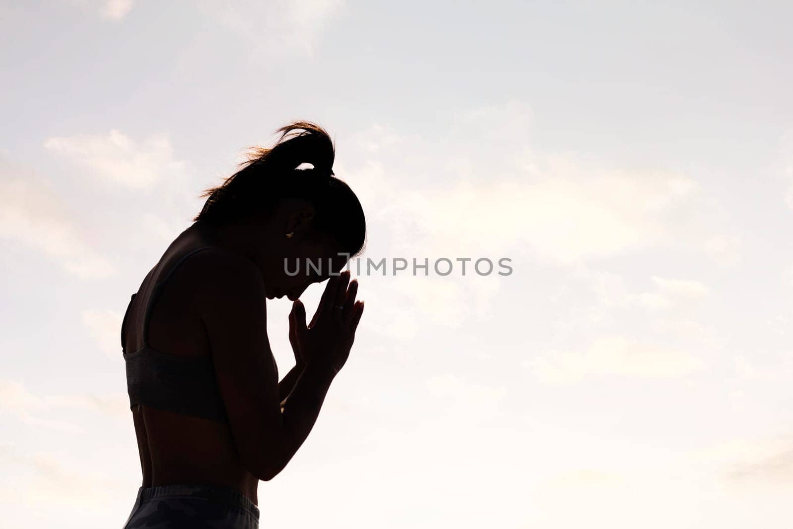 woman practicing yoga in pray position by raulmelldo