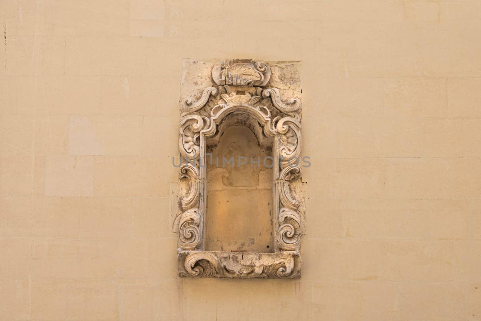 Valletta, Malta, April 03, 2024. an ancient niche decorated on a wall of a house in the historic center of the city