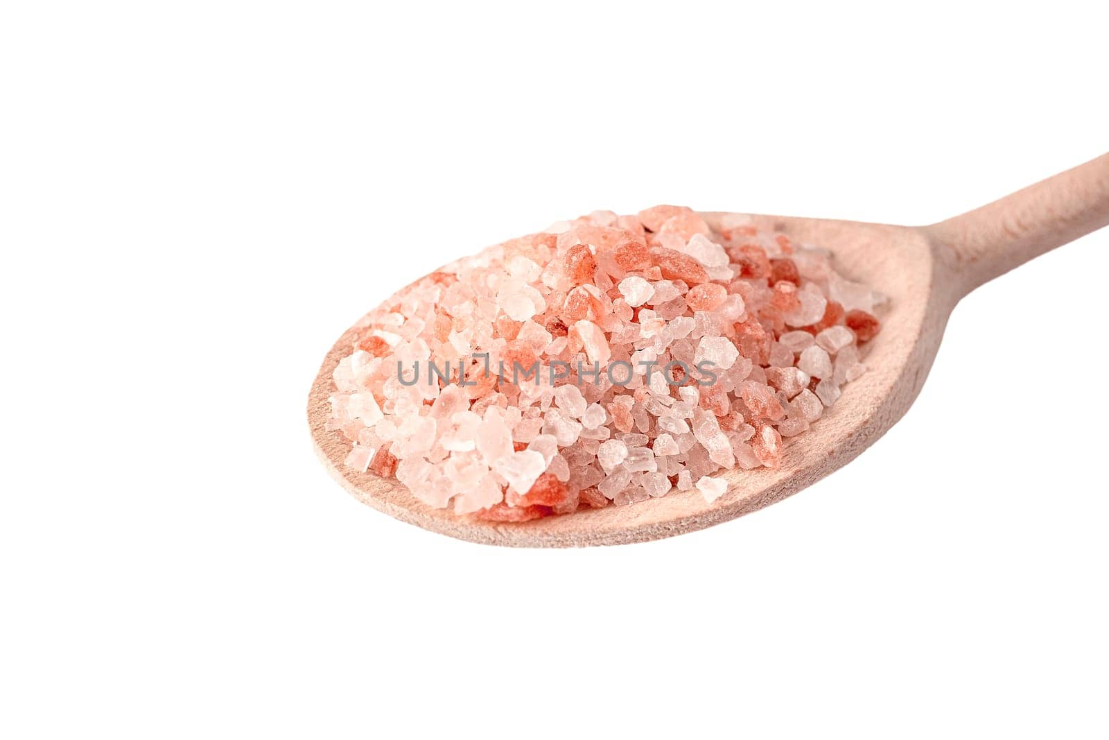 Pink Himalayan salt in wooden spoon isolated on white background.