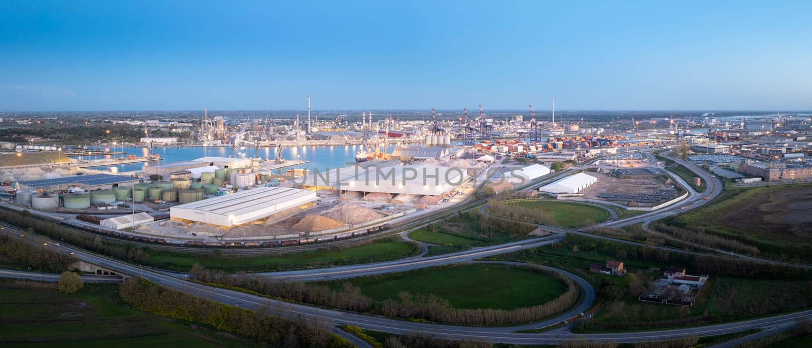 Aerial view of the thermoelectric and metallurgical plants at night by Robertobinetti70