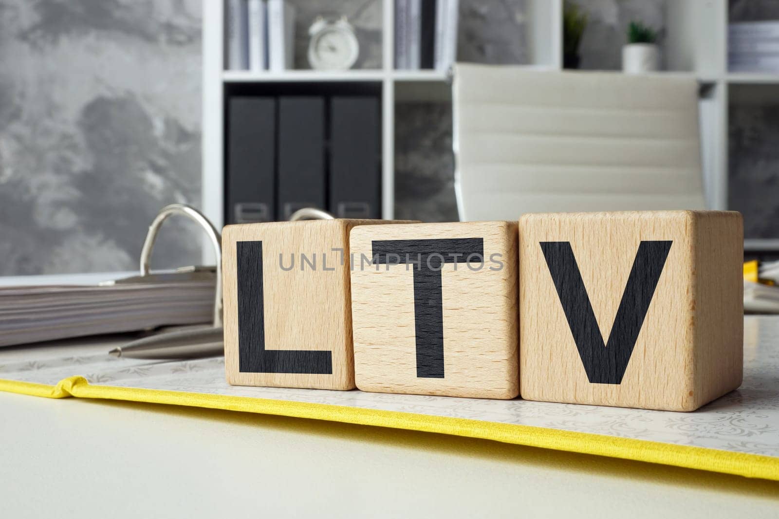 Office folder with cubes LTV Lifetime Value. by designer491