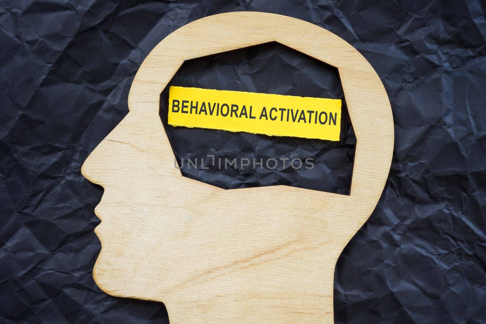 Head shape with phrase Behavioral activation. by designer491