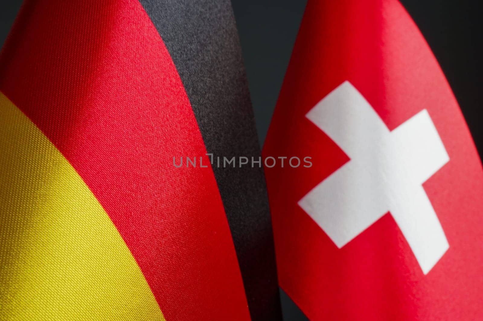 Nearby are small flags of Germany and Switzerland. by designer491