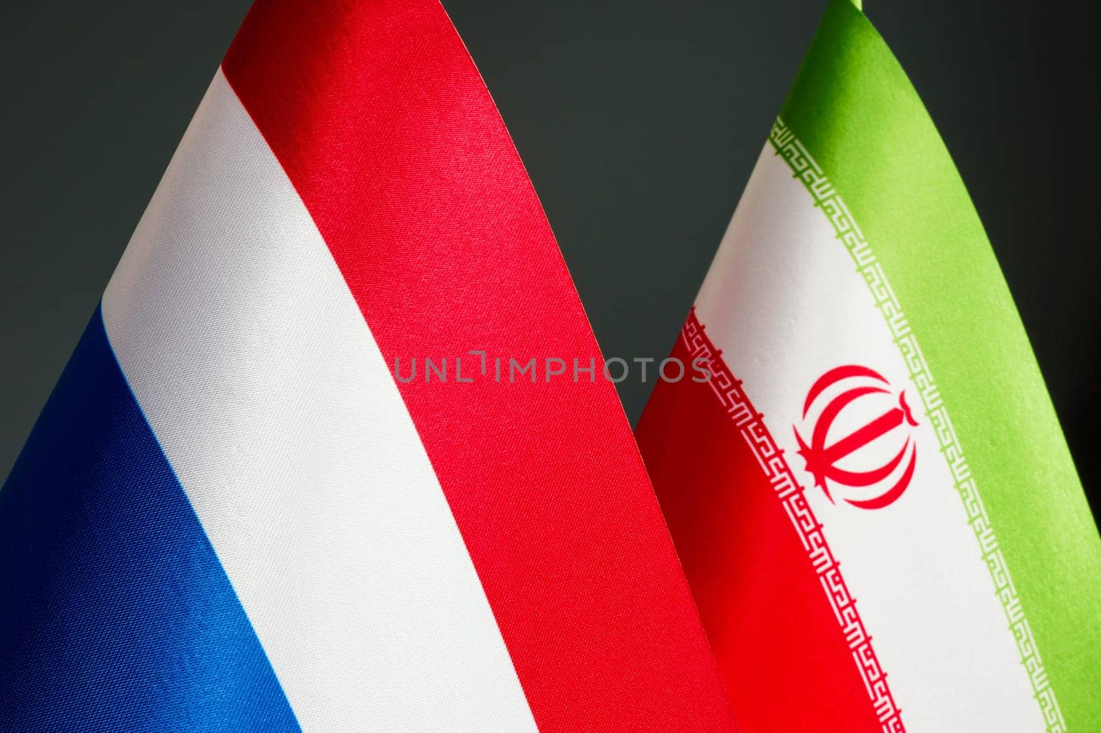 Close-up of the flags of the Netherlands and Iran. by designer491