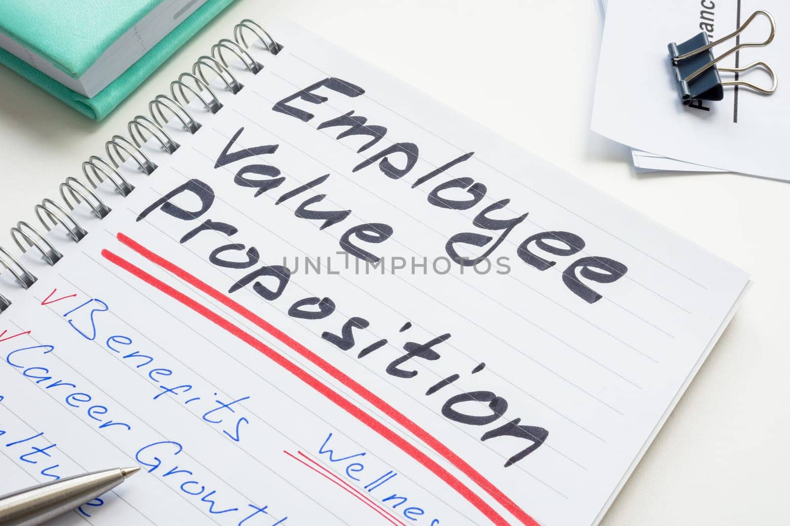 Handwritten notes in a notepad about Employee value proposition EVP. by designer491