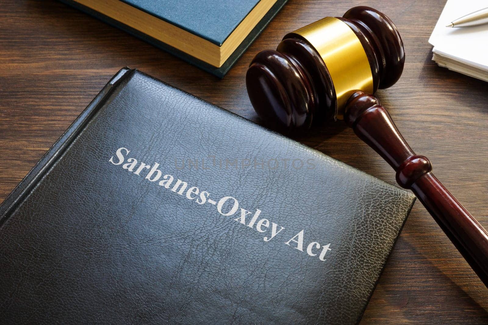 Sarbanes-Oxley act. Book with laws and gavel on the table.