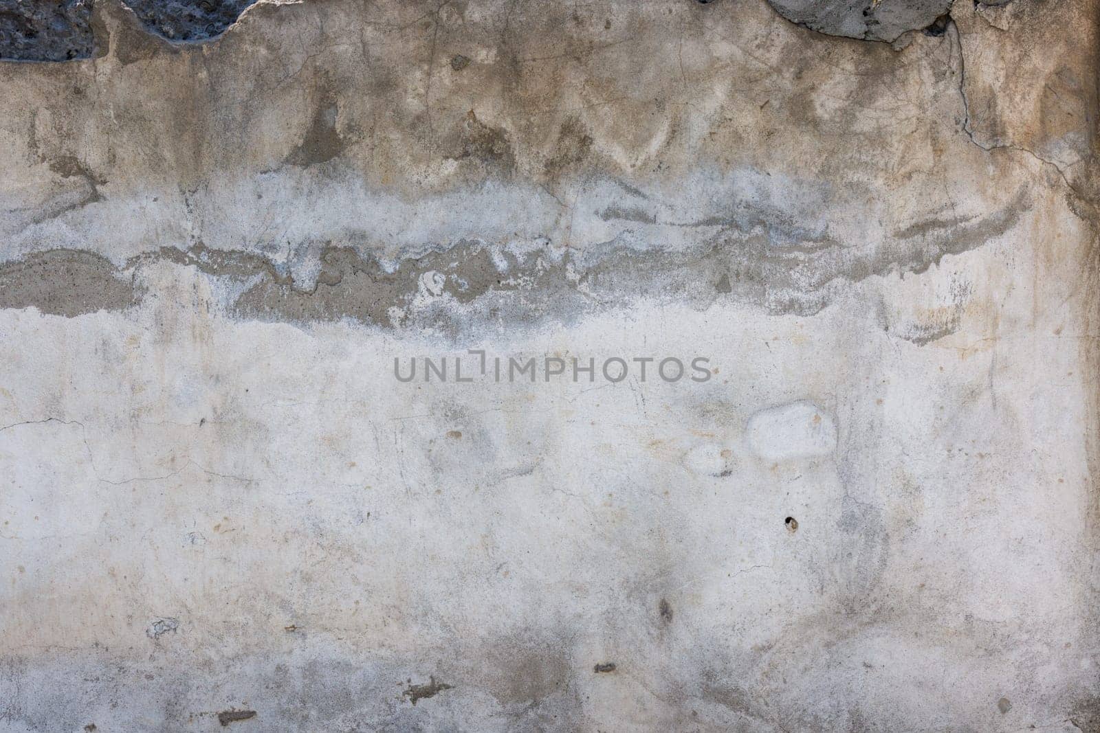 Old water damaged plaster wall surface - full-frame background and texture by z1b