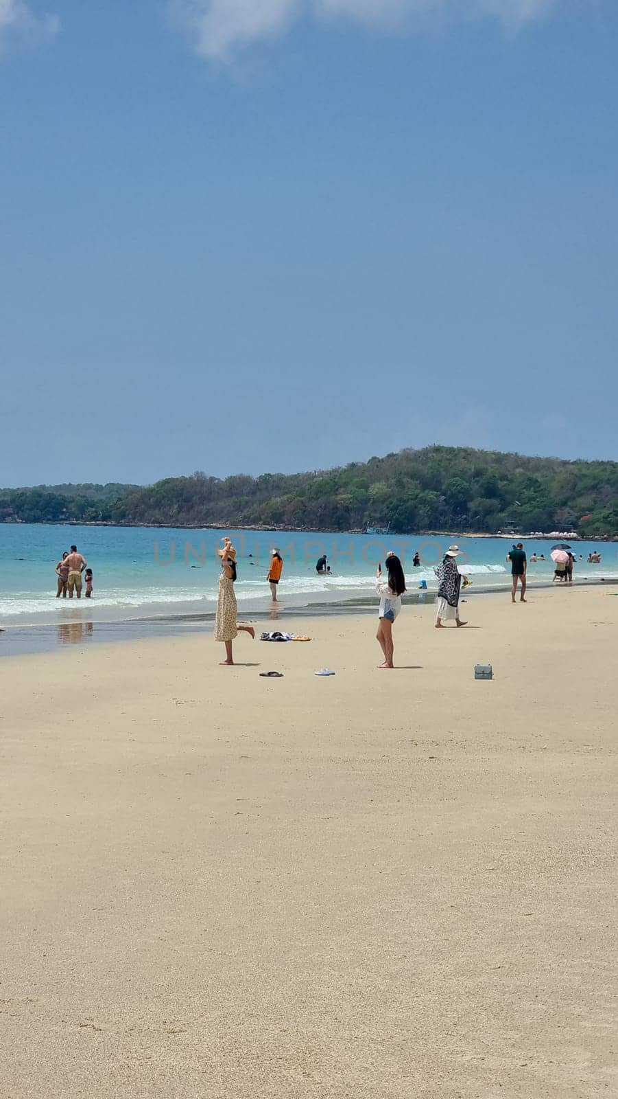 Rayong Koh Samet Thailand 27 March 2024, Chinese tourist on the beach of Koh Samet taking photos and selfies