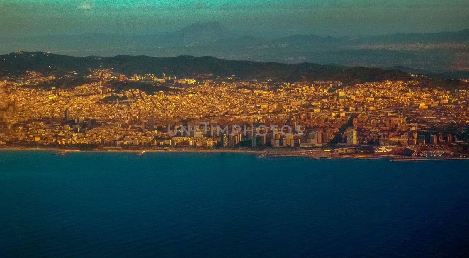 view of Barcelona from the plane by kempel