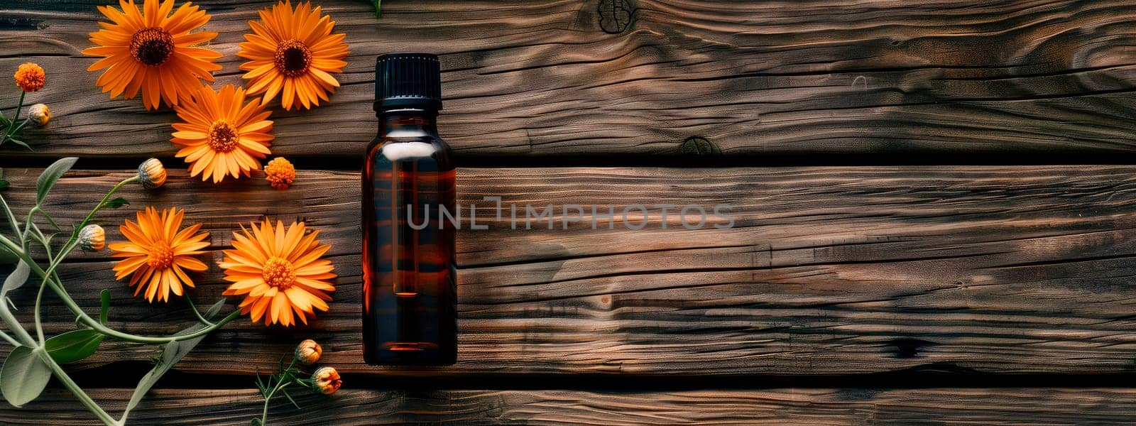 calendula essential oil in a bottle. Selective focus. Nature.