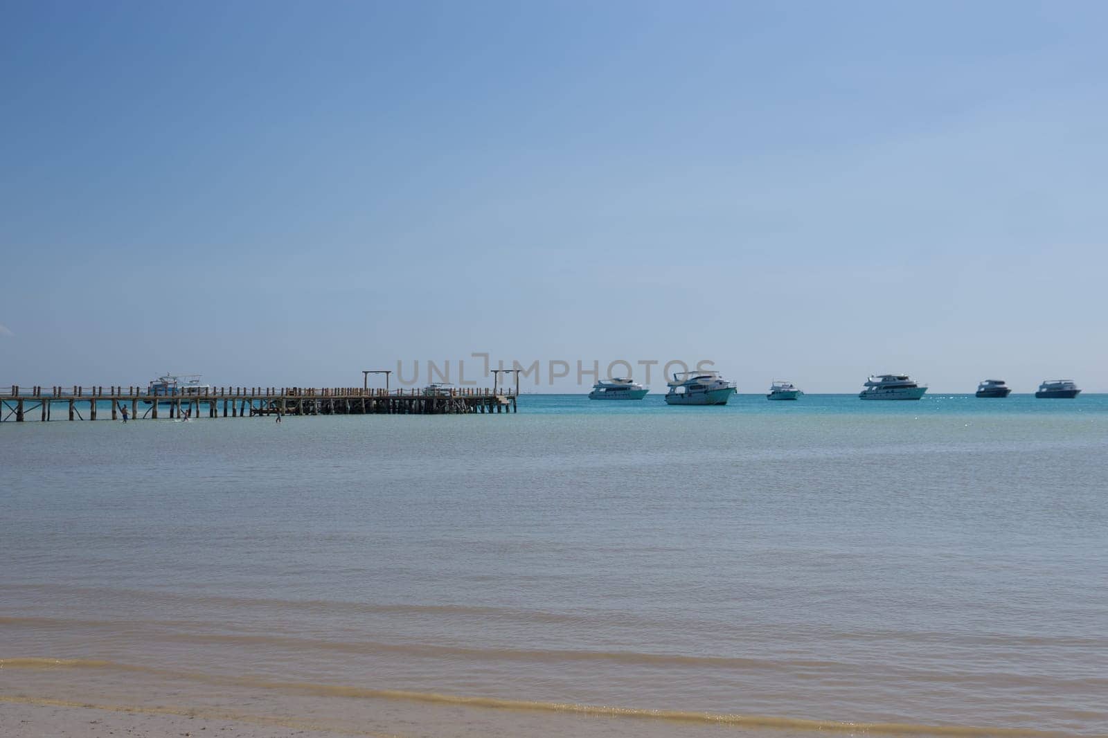 Beach Relaxation at the Red Sea. Fairy-tale Moments of a Sunny Day. The concept of tourism and sea travel.