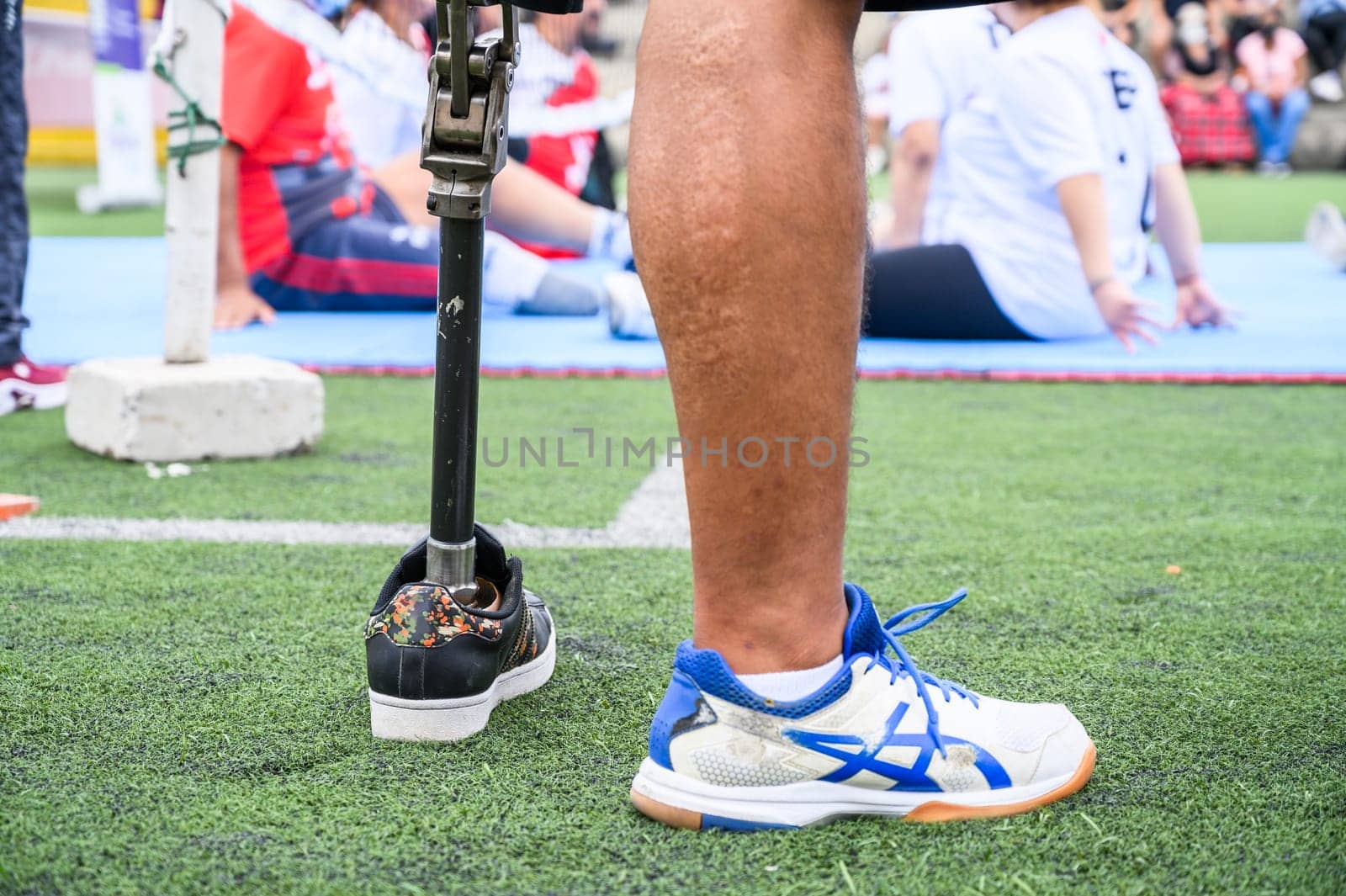 Unrecognizable male athlete with a prosthetic leg. by Peruphotoart