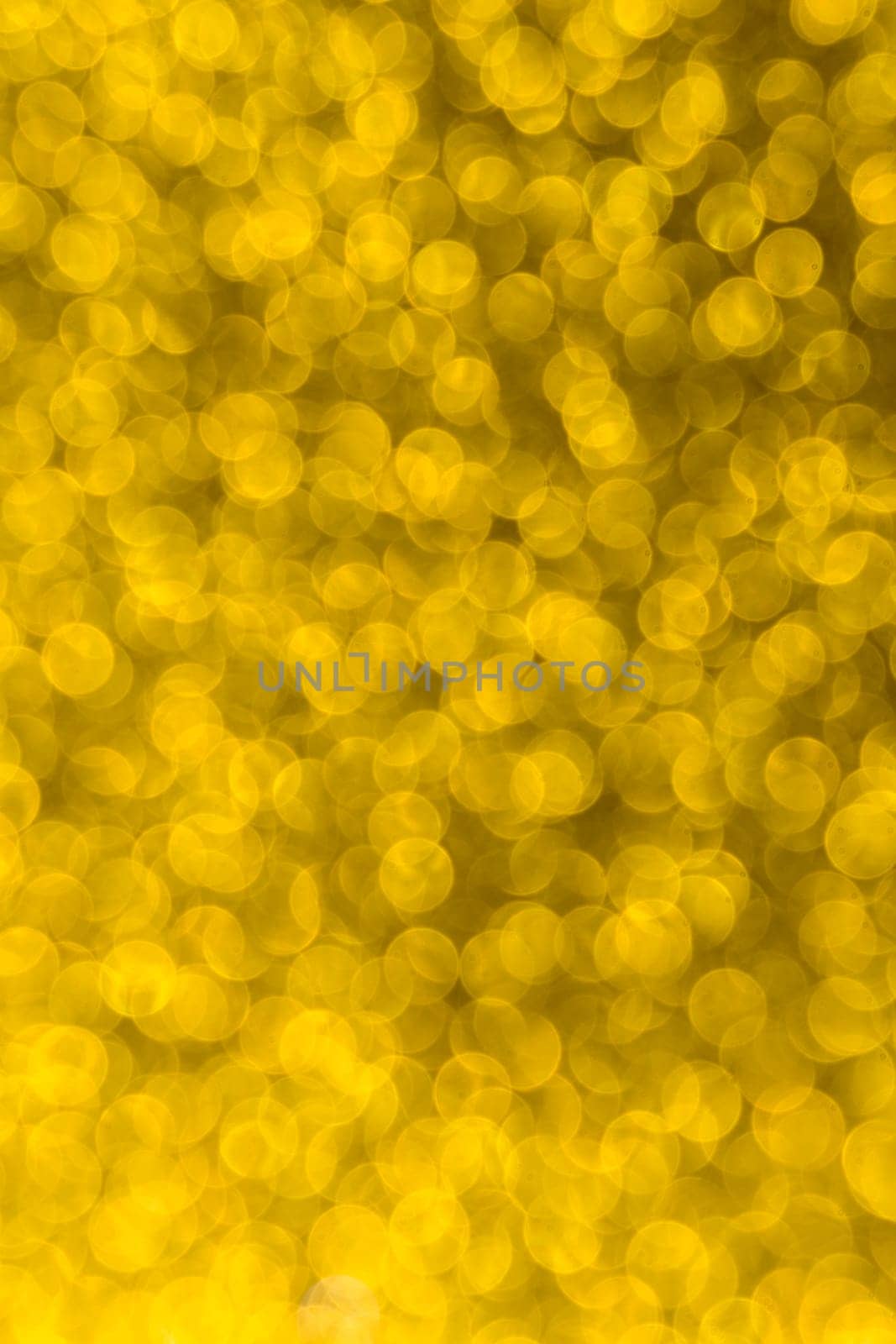 Abstract christmas lights glitter background. christmas gold texture background.