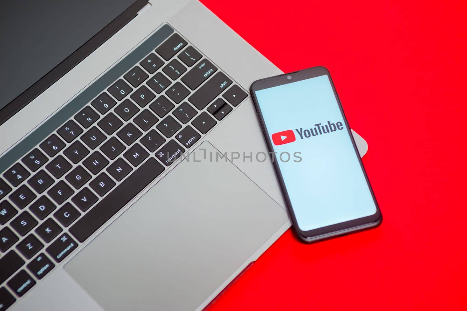 Tula, Russia - May 18,2020: Modern Smartphone with Youtube logo on the screen by zartarn