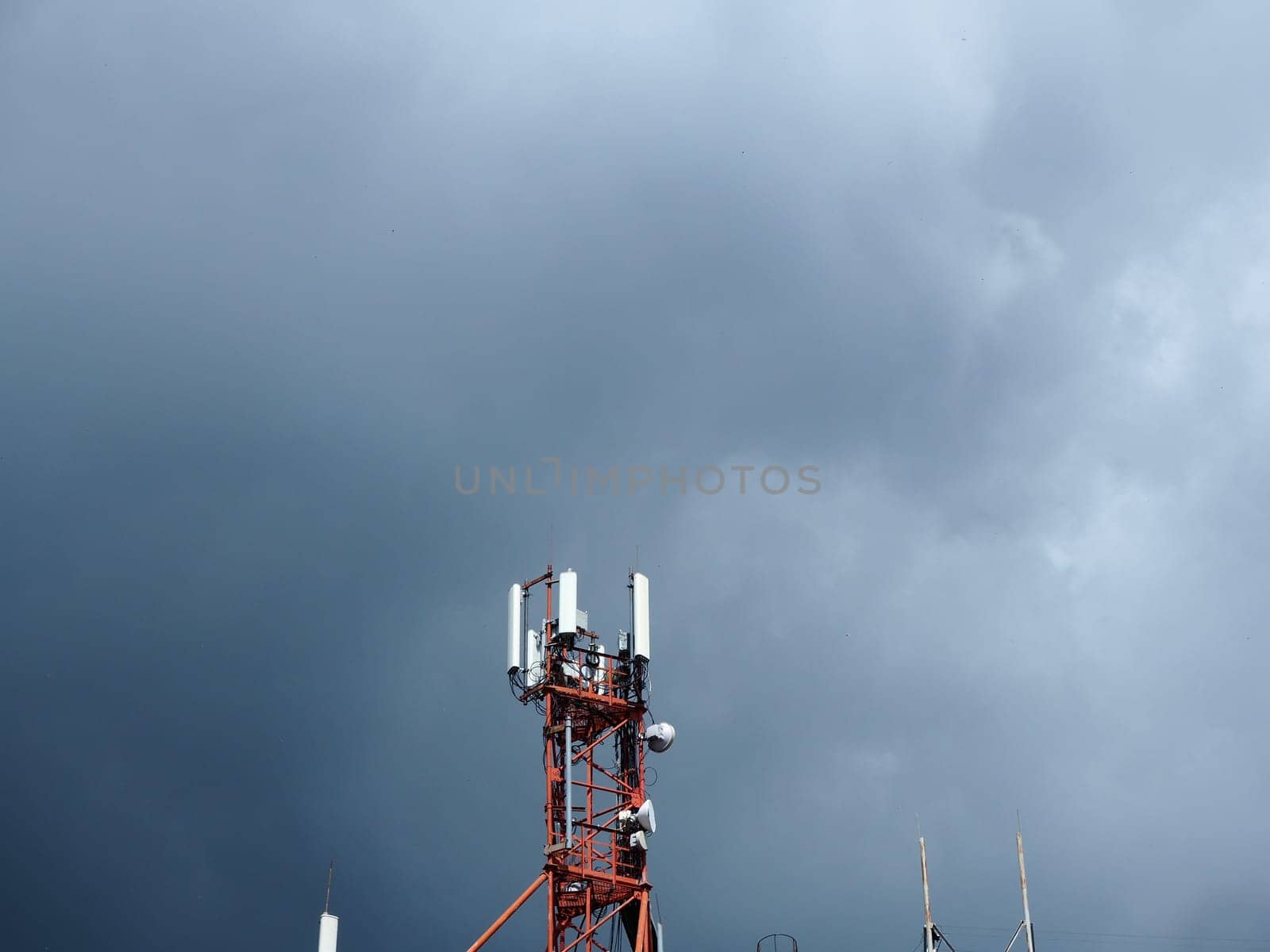 Telecommunication tower with copy space.Digital wireless connection system.Development of communication systems in urban areas.Modern Business Communication Concept. by zartarn