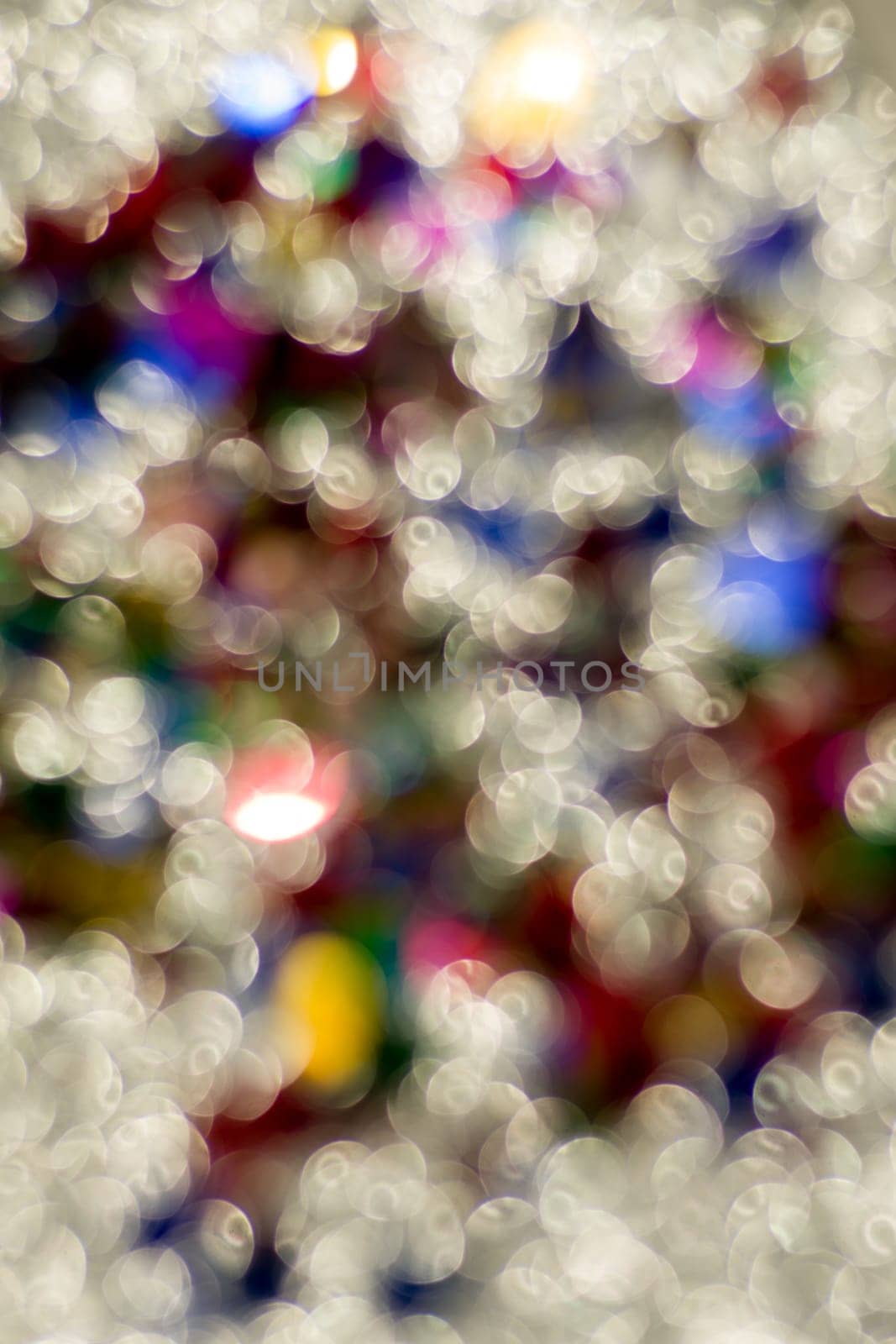 Abstract glitter color lights chrismas background. de-focused by zartarn