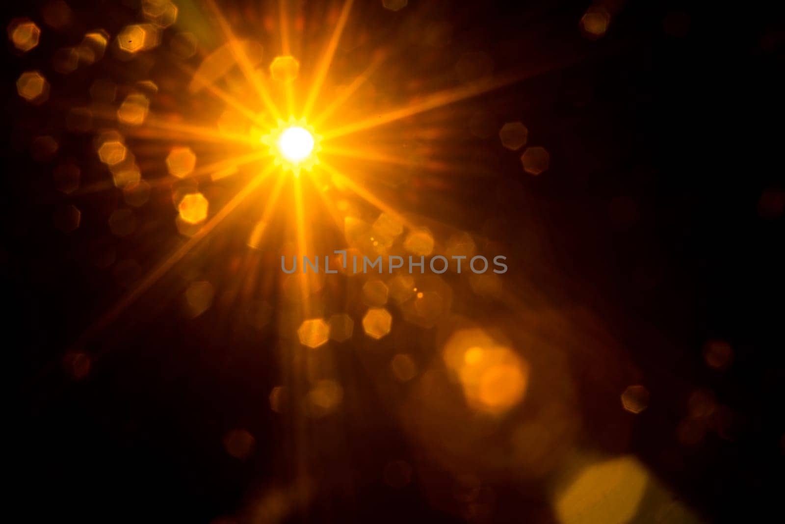 Abstract Natural Sun flare on the black.