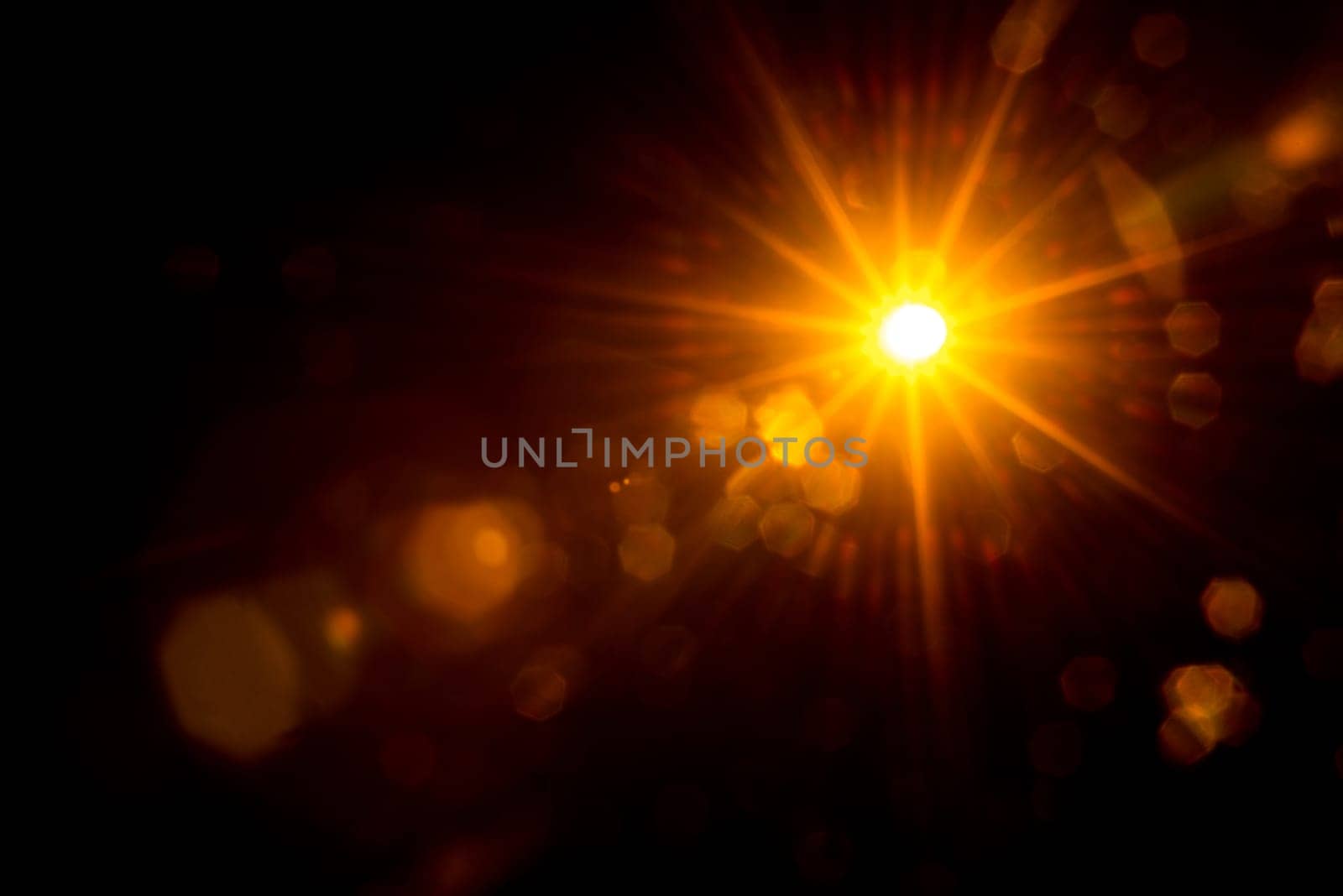 Abstract Natural Sun flare on the black.