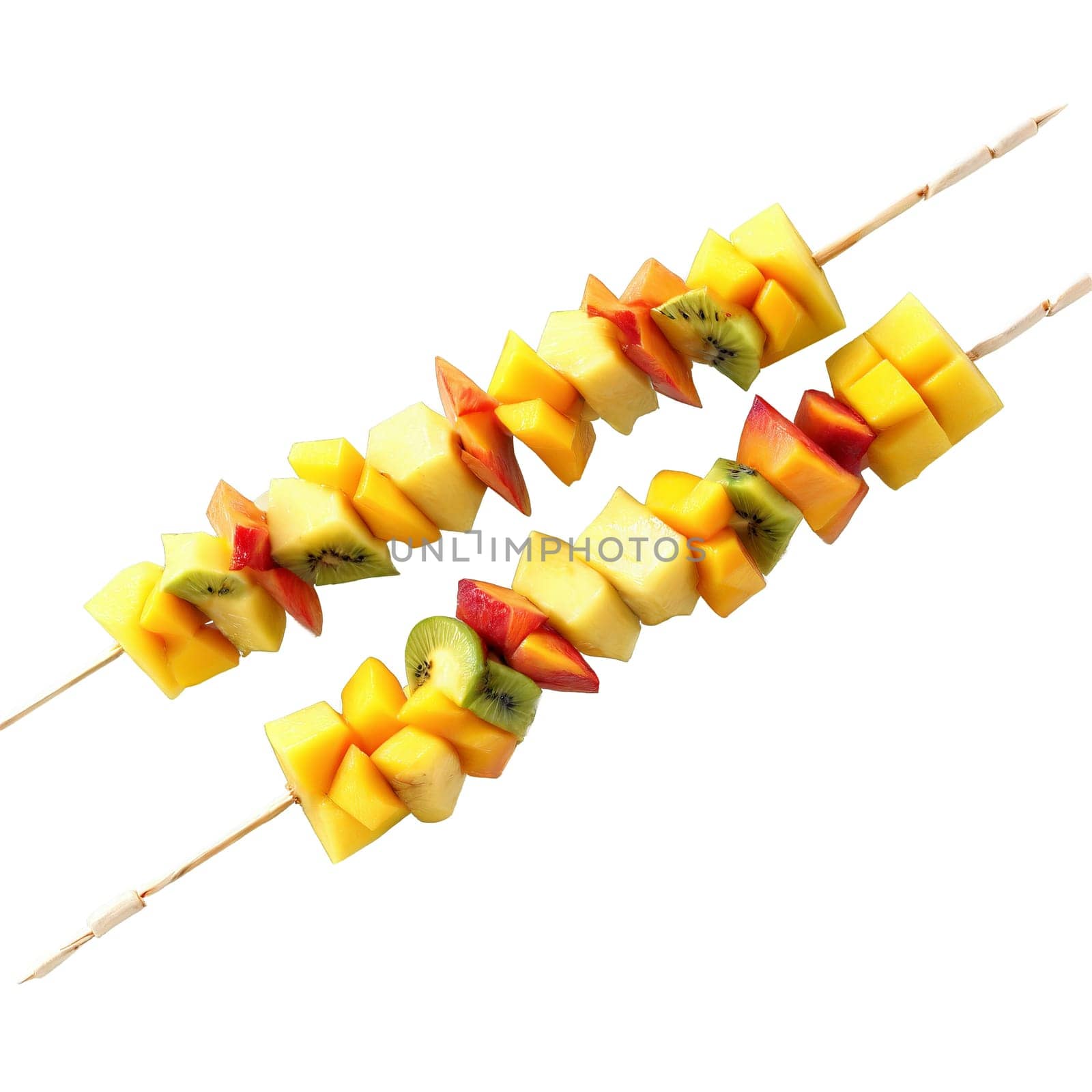 Breakfast fruit kebabs with cubes of pineapple mango and papaya threaded onto skewers and served by panophotograph
