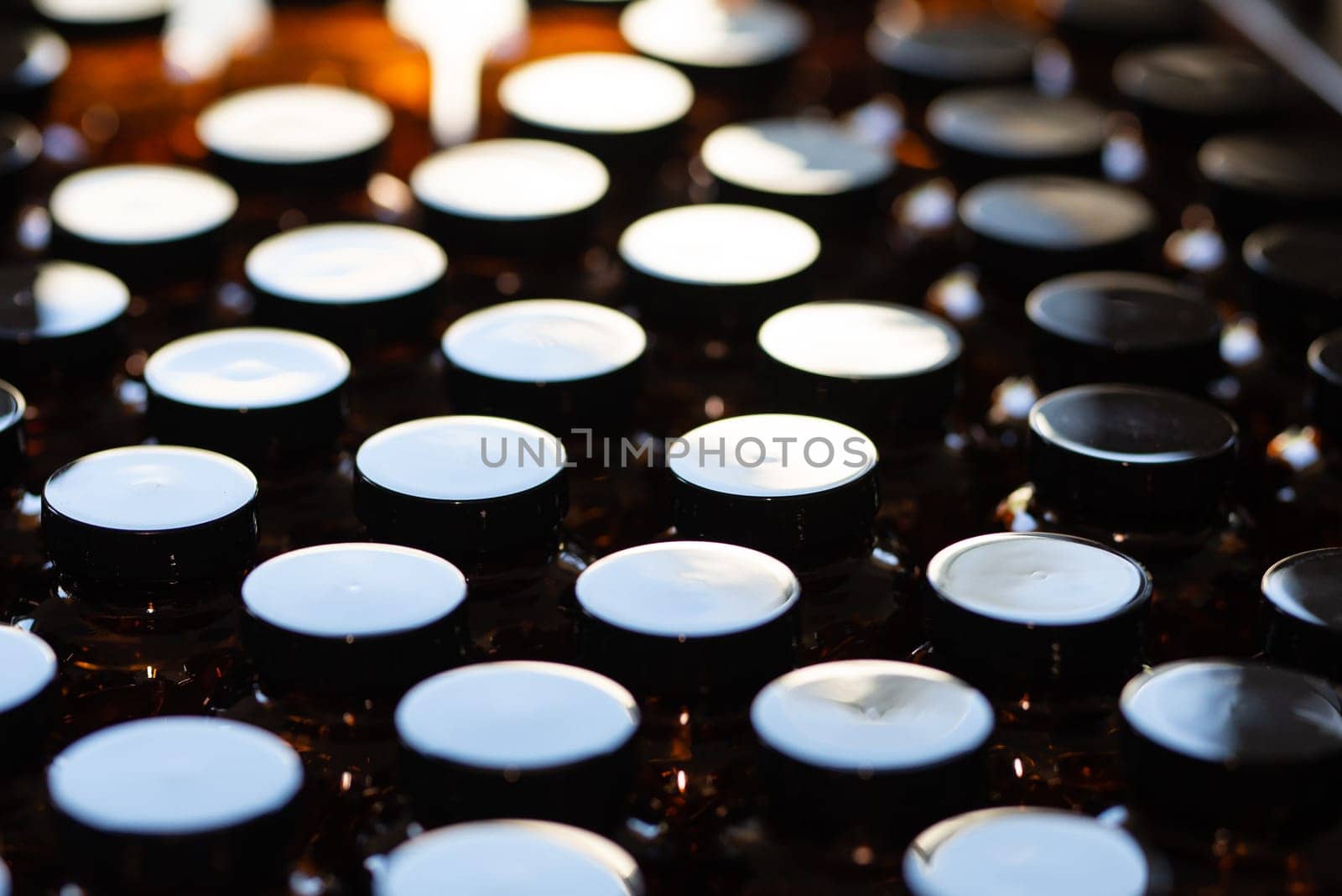 brown glass bottle for supplement product with white cap isolated on white background. High quality photo