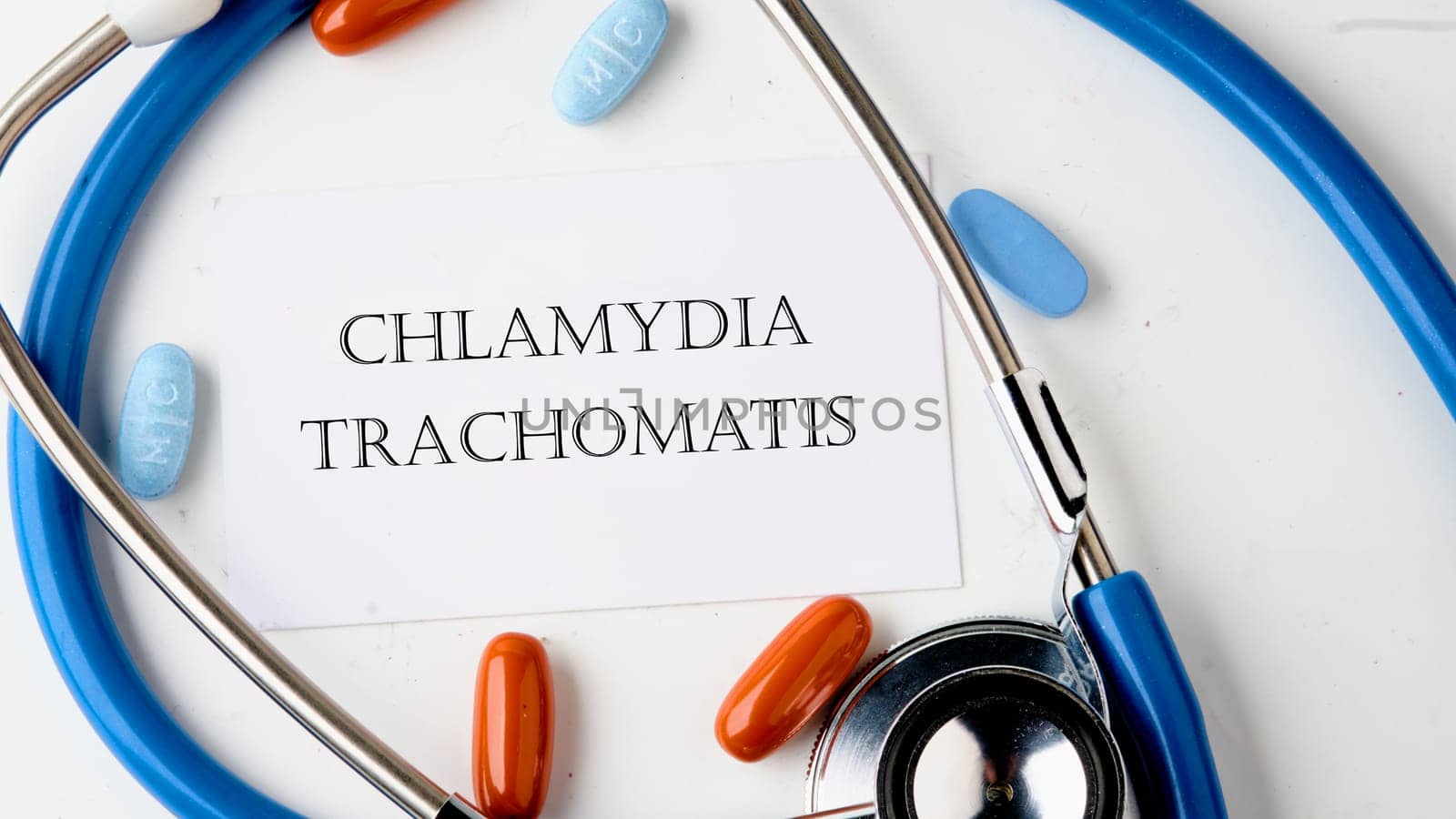 Chlamydia trachomatis on the card on a white background. Concept photo