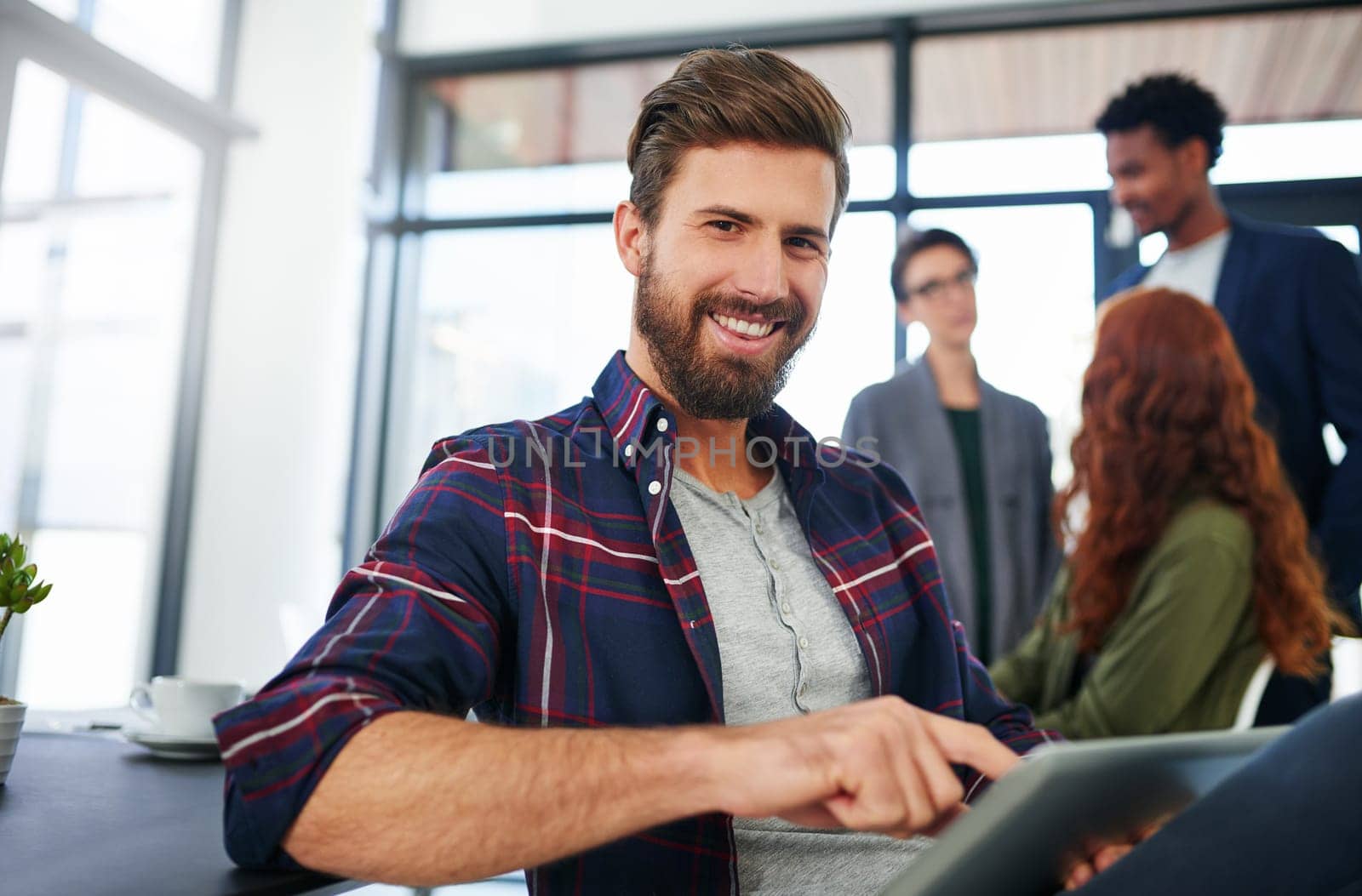 Businessman, portrait and digital tablet in office with smile for creative research, schedule or planning. Entrepreneur, employee or happy with online article for project, communication or web search.