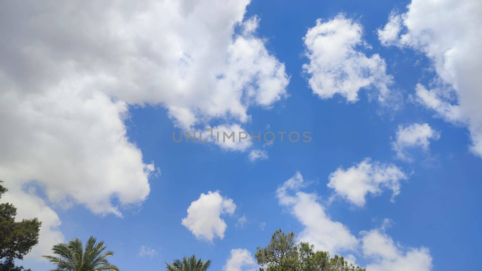 blue sky, white clouds background spring nature weather atmosphere. High quality photo