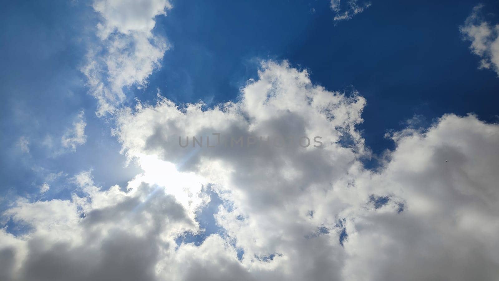 blue sky, white clouds background spring nature weather atmosphere. High quality photo