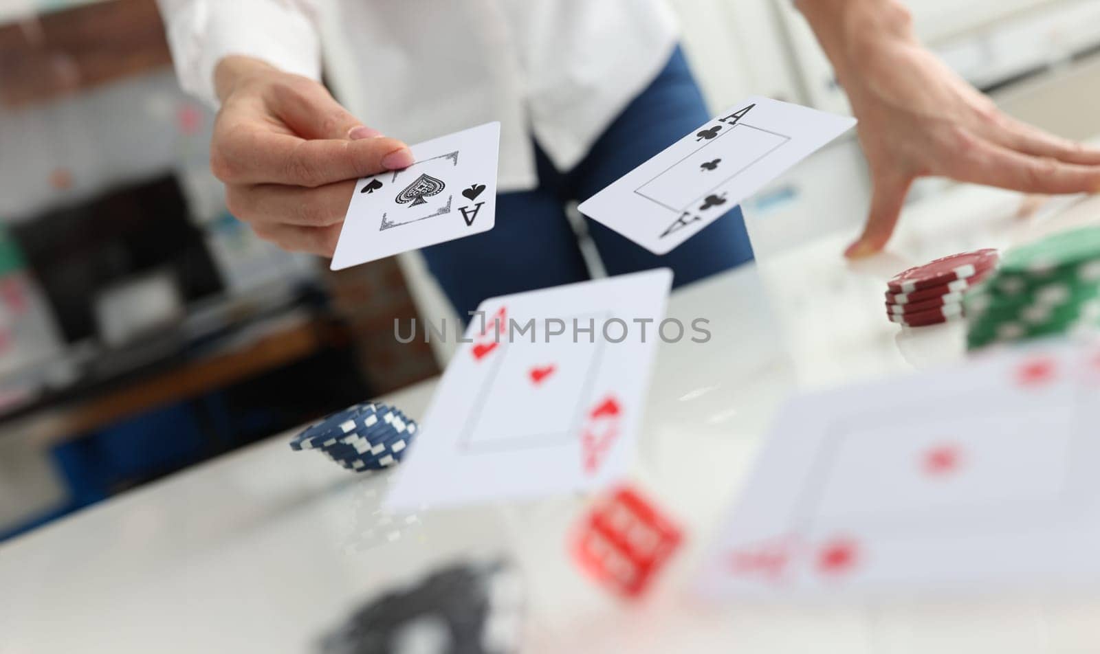 Person throws playing cards on table closeup by kuprevich