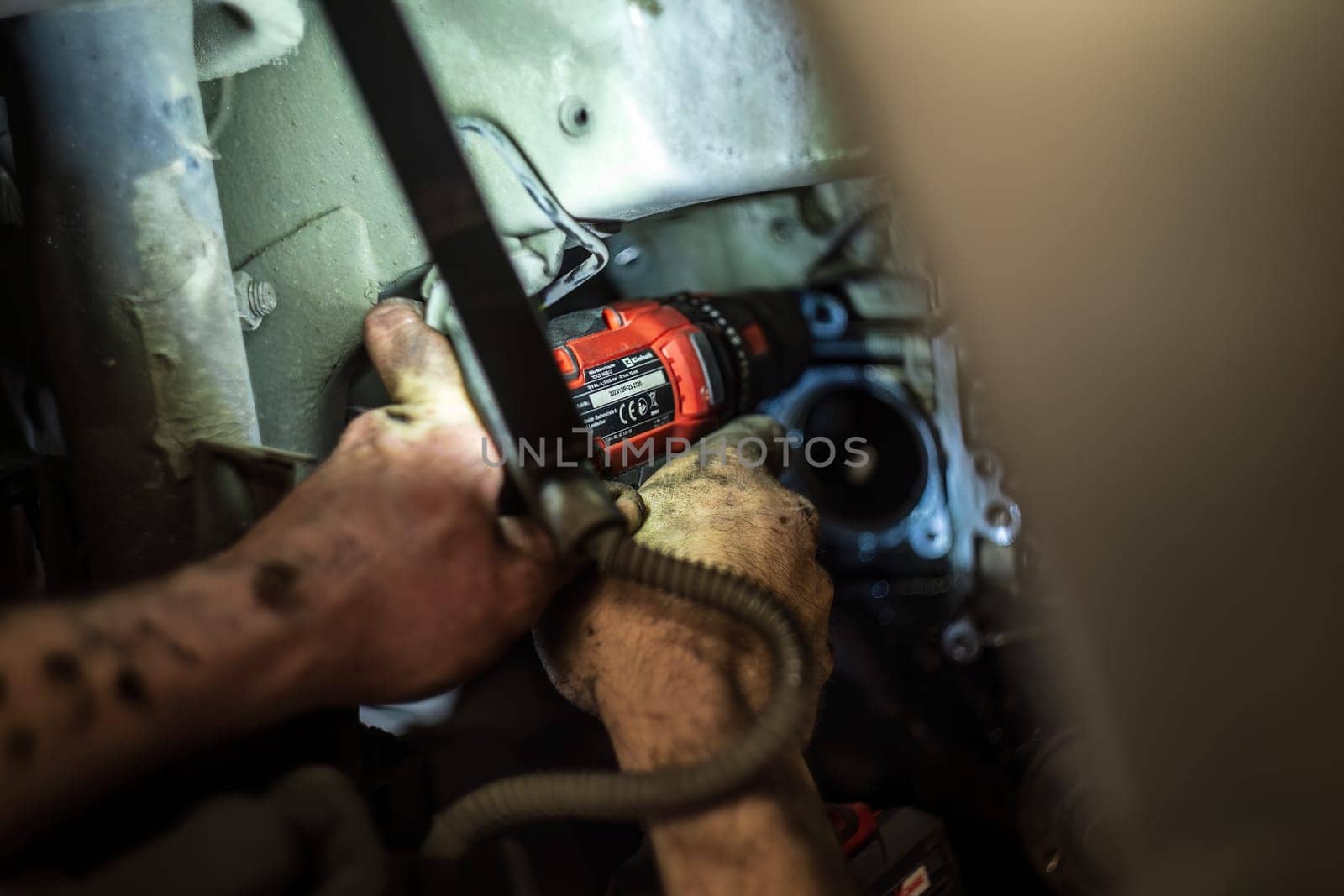 Milan, Italy 9 April 2024: Screwdriver resting on the workbench in the garage workshop.