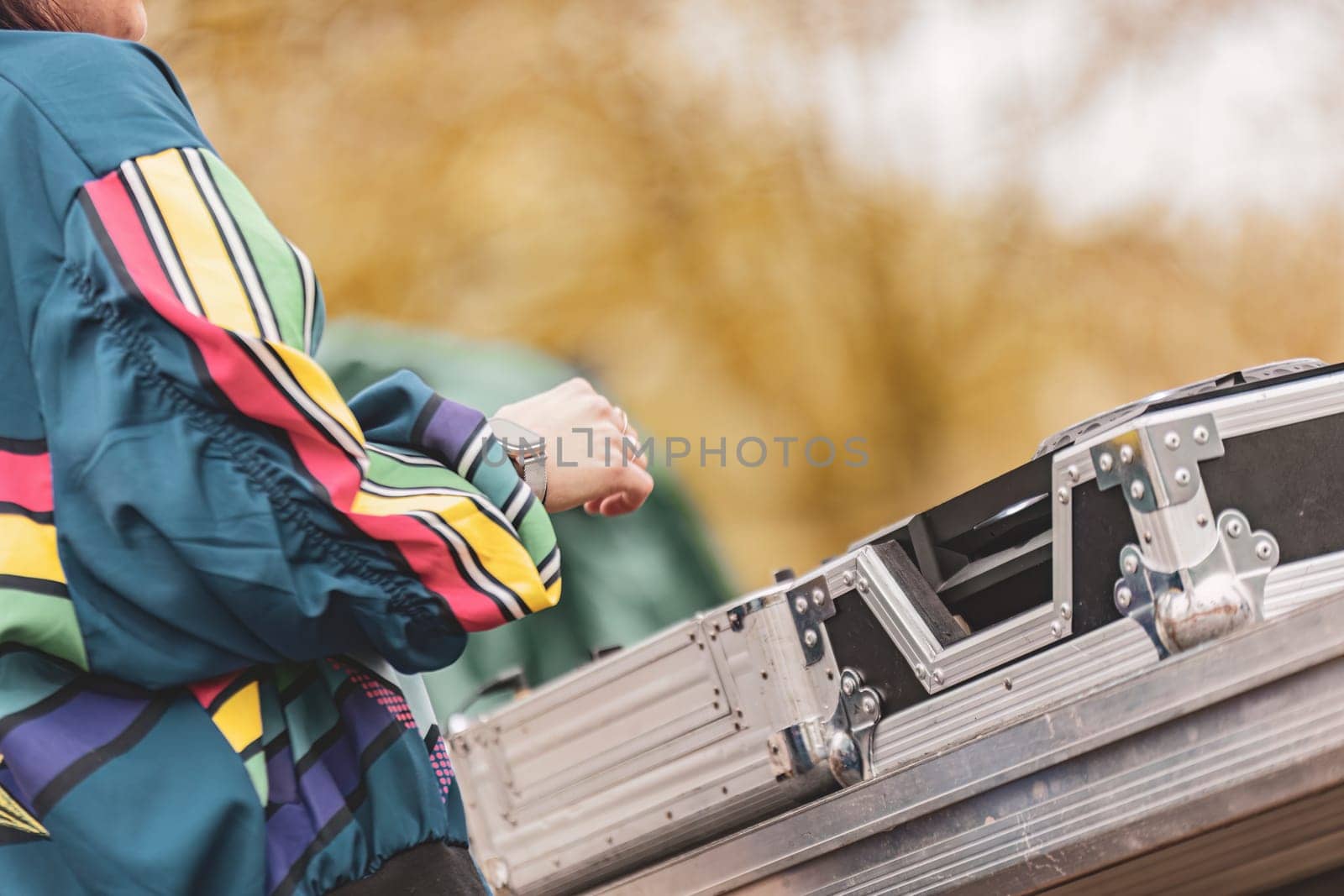 Milan, Italy 1 April 2024: Close-up of DJs' hands manipulating a console, energizing the rave party with their thrilling music set.