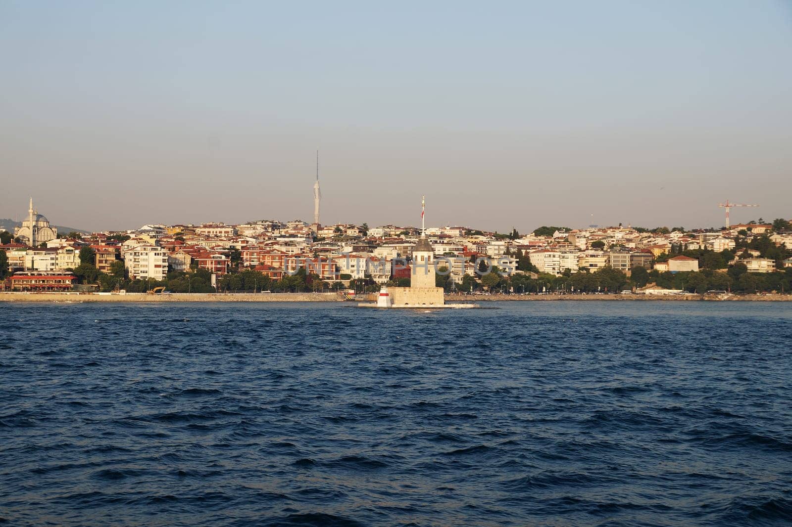 view of the Istanbul coast from the sea on a sunny day.