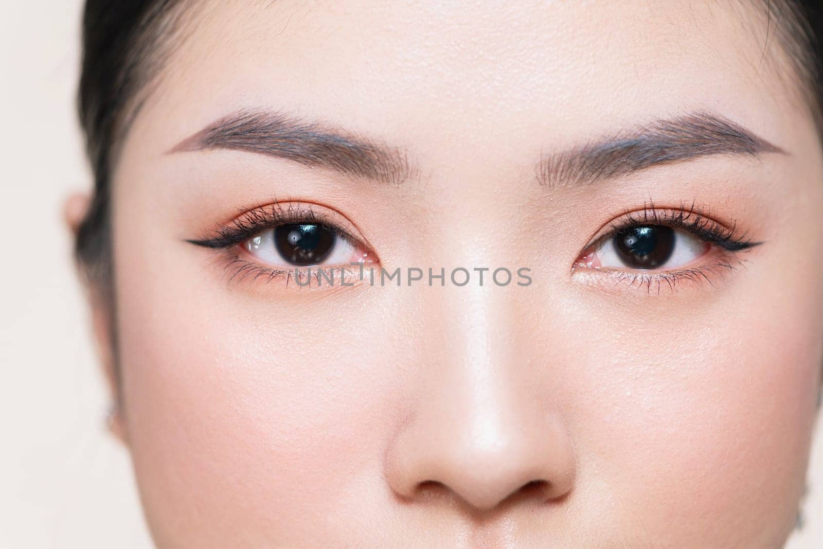 Close-up macro of beautiful female eye with perfect shape eyebrows