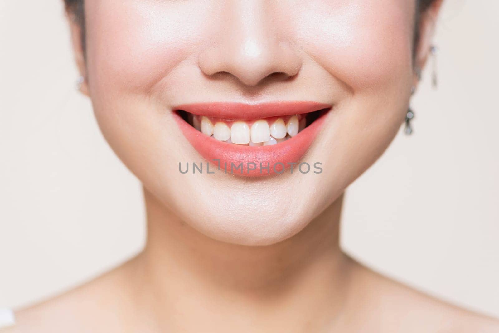 Beautiful young woman's full lips close-up, perfect skincare concept