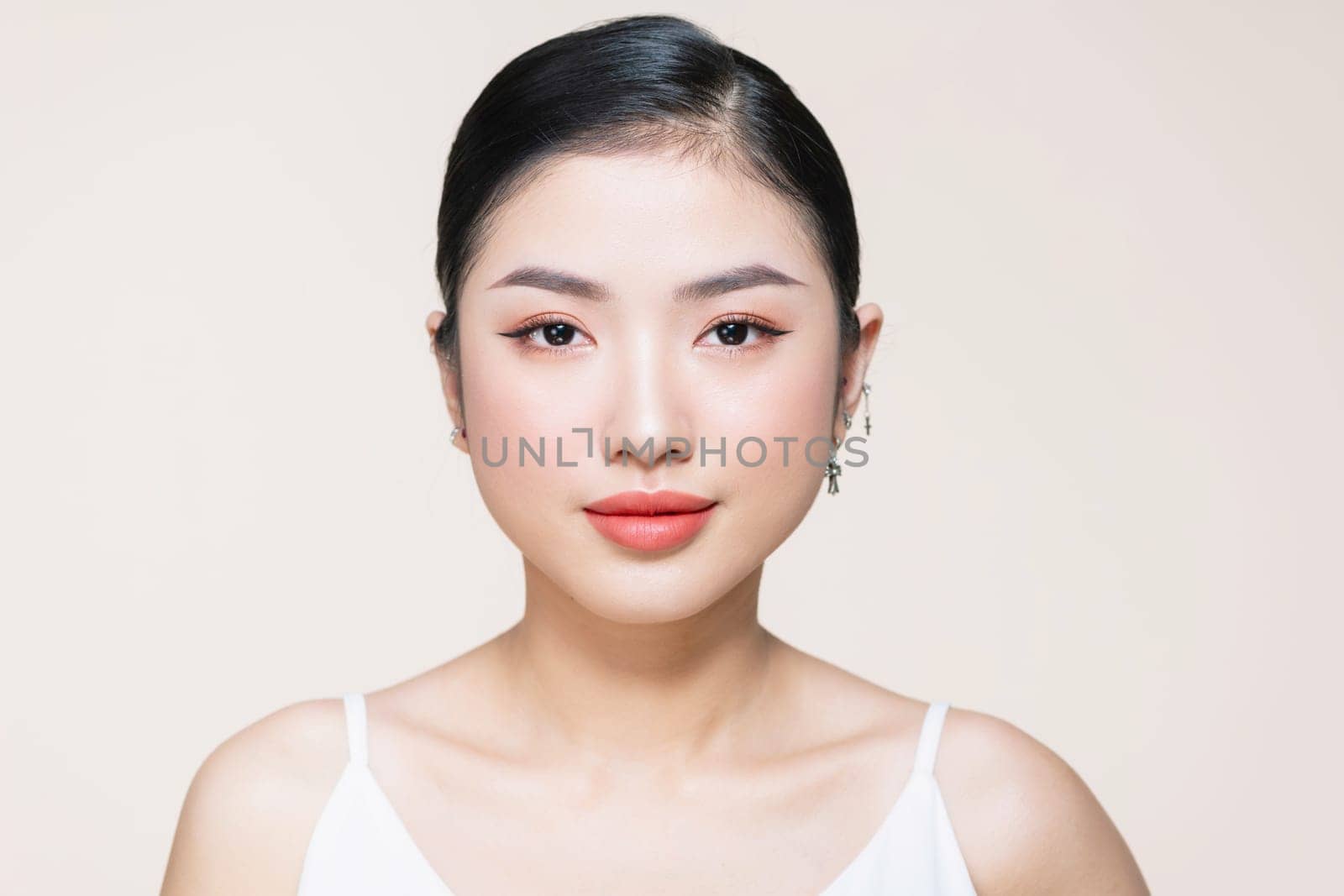 Beauty woman healthy clean skin beautiful female young model isolated on beige