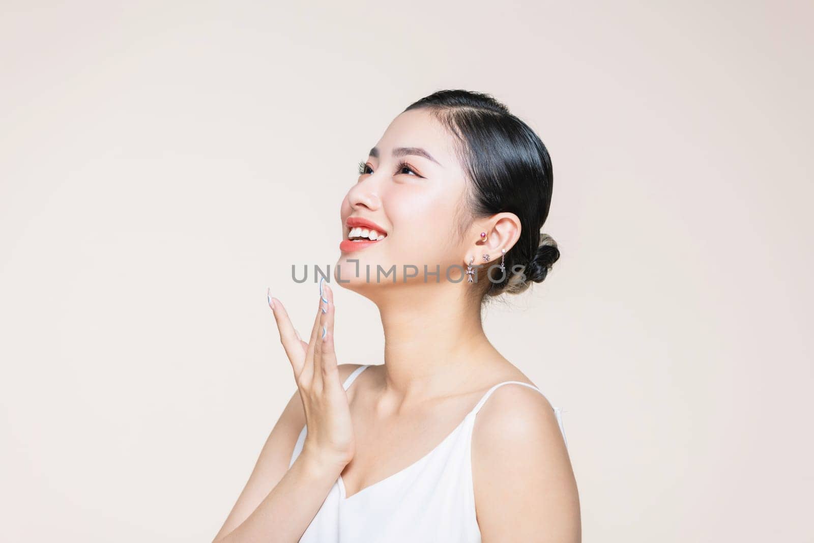 Woman face profile side view. Chin lift pointing with index finger