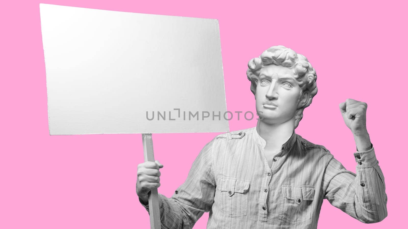 Abstract modern collage. The man with the plaster head of David Angry protesting worker with blank protest sign on pink background by zartarn